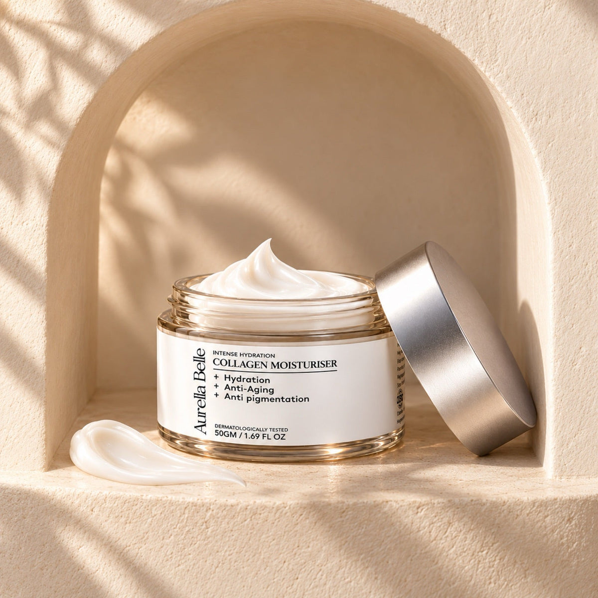 Collagen Moisturiser jar open in a sand-coloured arched niche